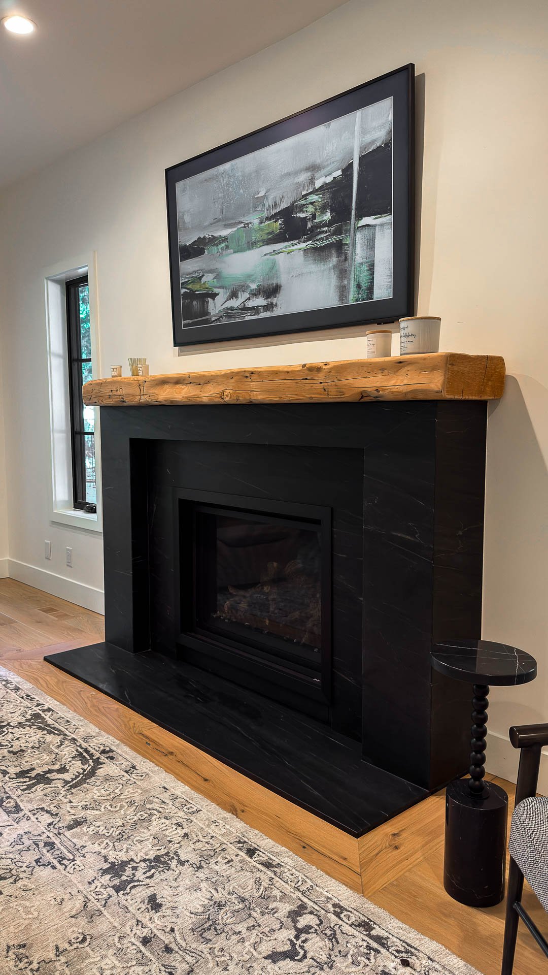Black soapstone fireplace surround and hearth