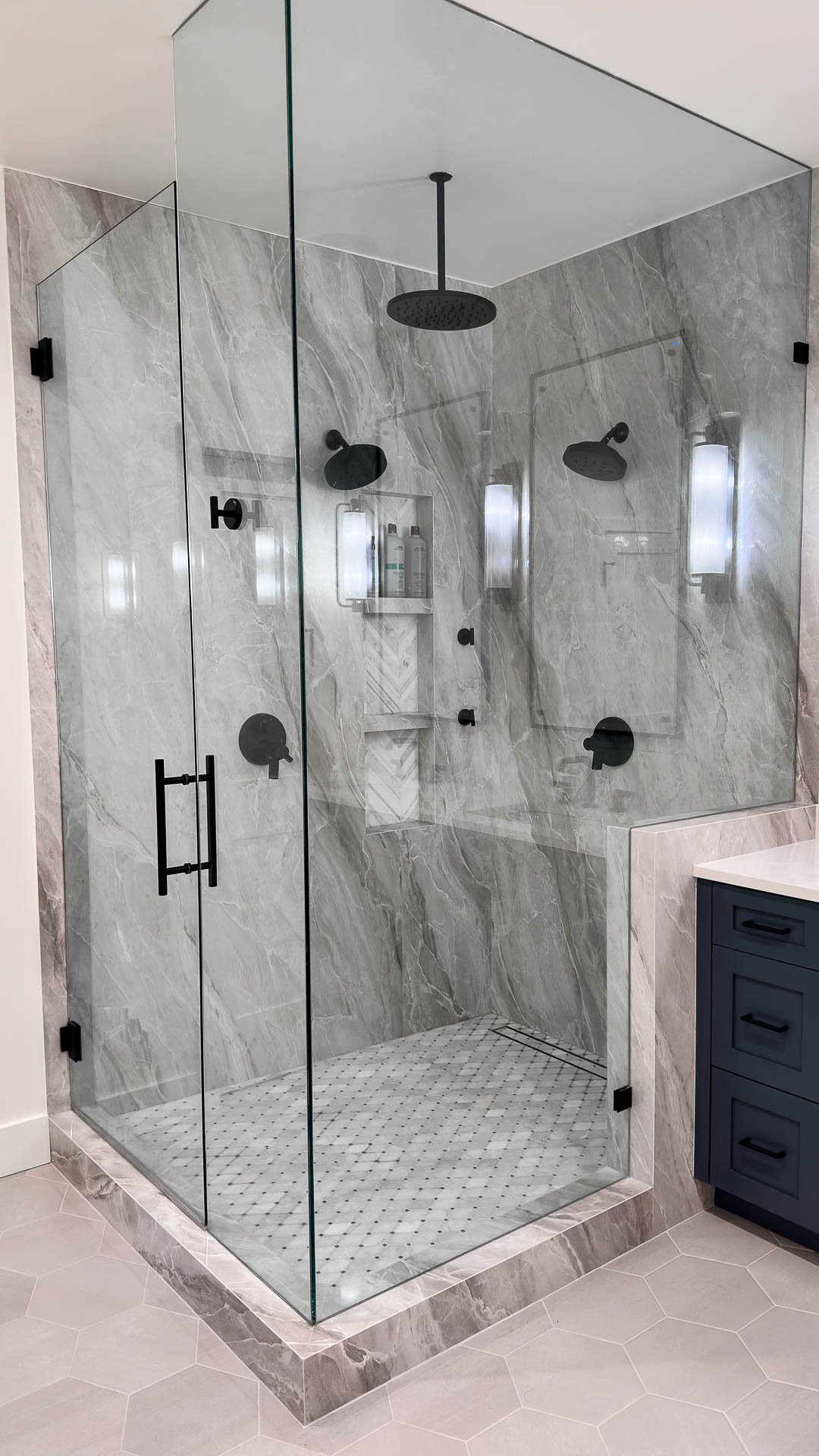 Porcelain slab shower walls and curb top